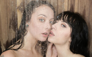 Dark-haired lesbians with little titties and tattoos take shower outdoors