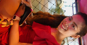 Thai bitch in a red dress never stops smiling even in the backseat of a taxi