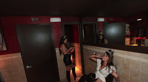 Lesbo bitches get drunk and lick each single other's twats in public toilet