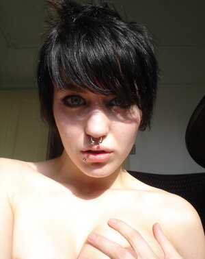 Student with a nose ring is so hot that she goes wild about her own body