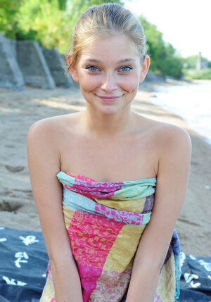 A charming chick with blue eyes and innocent smile is here for you