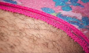 Frizzy hair sweetie shows her sizeable black unshaved fuck hole for you