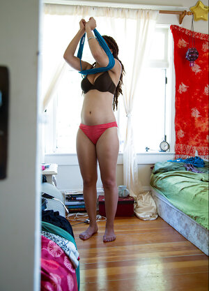 Geeky chick in glasses showing her meaty ass and teasing also