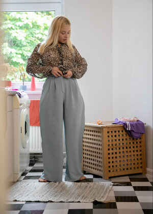 Tubby blonde floozy Bianca B is showing off for the camera as well