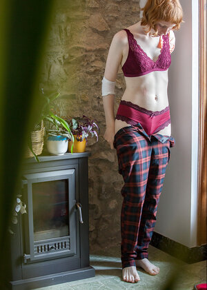 Redheaded sweetie puts on her pants and looks utterly, utterly good