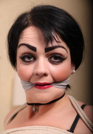 Hot legal teen with a heavy makeup is straightforward prey for pervert because she is hogtied