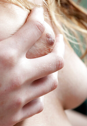 Adorable gal with long legs shows her ass and looks great