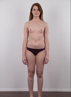 She has a signature boring office style that makes her sexy