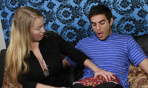 Desiree Deluca gets his cum on her large boobs after the handjob