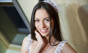 Arwen Gold wearing a maid outfit as she puts on a individual show