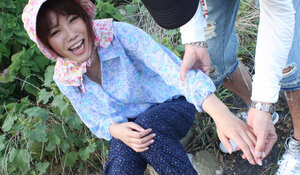 Japanese kitten gets pleasured through her pants in rubber boots