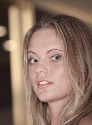 Blonde Hungarian cutie pie Vanda Lust enjoys unveiling her hot natural tits