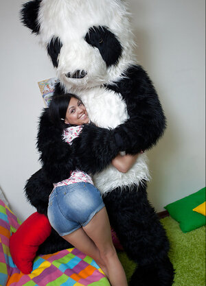 Slender teen brunette in pigtails strips and plays with her vibrator