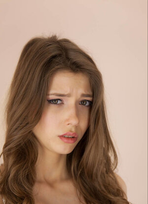 Beautiful babe Mila Azul finger fucks her glabrous pussy on the chair
