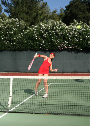 Penny Flame flaunts her hot tooshie and additionally deep cleavage in a tennis dress