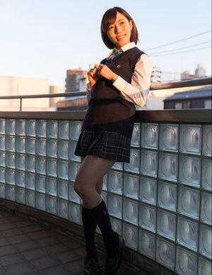 Nice-looking Japanese schoolgirl likes to show off her perky tits