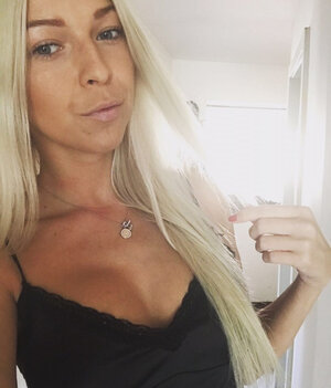Slovenian blonde mommy displays her tight cleavage & more