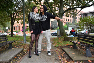 Stylish scarf Latina is going to pose in a nice-looking way in public