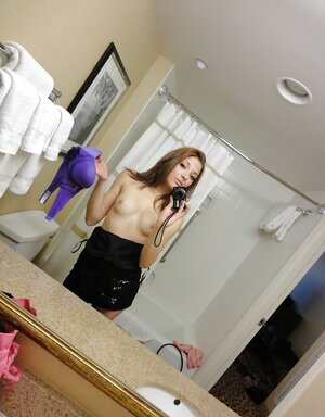 Frisky teenage gal takes pictures of her body taking clothes off step by step