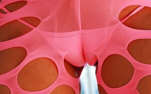 Hottie with lovely smile takes off sexy pink outfit and moreover shows her curves