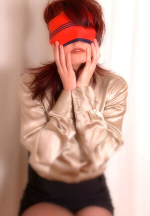 Compilation of porno pics of a pornostar with red hair being hogtied and besides blindfolded