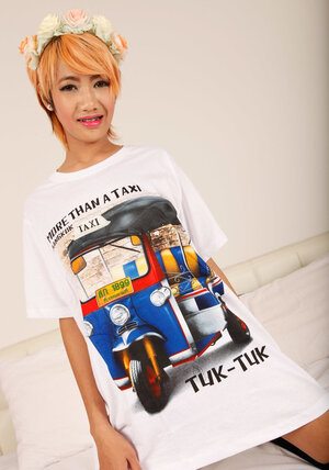 Redhead with flower wreath looks sexy even wearing a long T-shirt and furthermore high socks