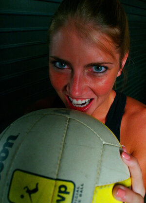 Sporty blonde Iva Zan poses for erotic session with her sexy shorts and furthermore top on