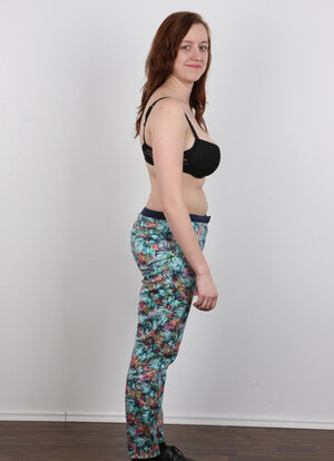 Enjoy with red hair leaves panties on exposing heavy milk sacks that make her slouch