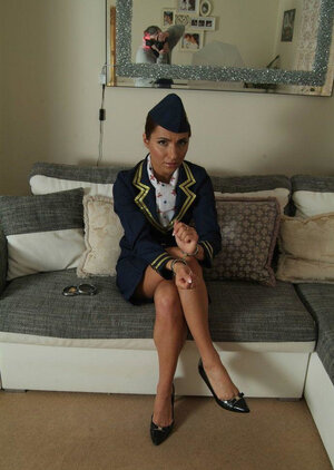 After flight glamorous stewardess gets handcuffed on couch by angry passenger