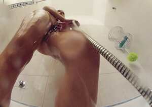 Hot brunette seductively washes in shower until operator wants to touch her cunny