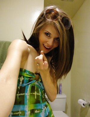 Chick in sunglasses invites friend to take pictures of small boobs and depilated pussy