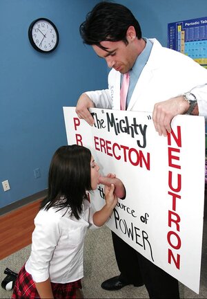 Brunette student gags on teacher's manhood through improvised gloryhole