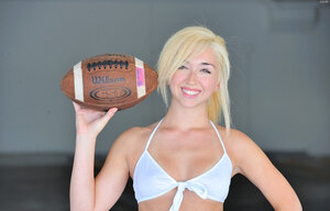 Hot kitten gets rid of unnecessary clothes and goes to the volleyball court