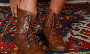 Curly Ebony kitten airs every single part of her pretty chocolate body