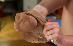 Lascivious lady-boss gets on the desk & peels off her nylons for the man to watch