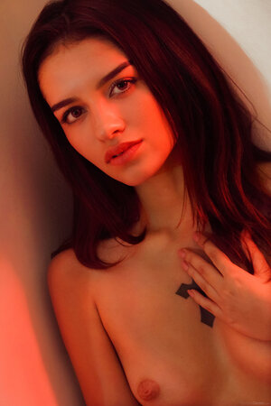 Hottie gently touches own pussy after freeing slim body from fishnet shawl