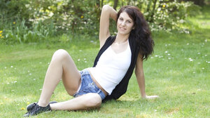 Black jacket is one and only thing that the performer wears in the vernal air