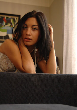 Sweet model Athina Love pulls undies aside to display her smooth coochie